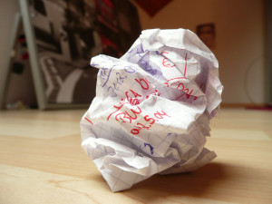 crushed paper - writer's block - crumpled paper with unfocused background